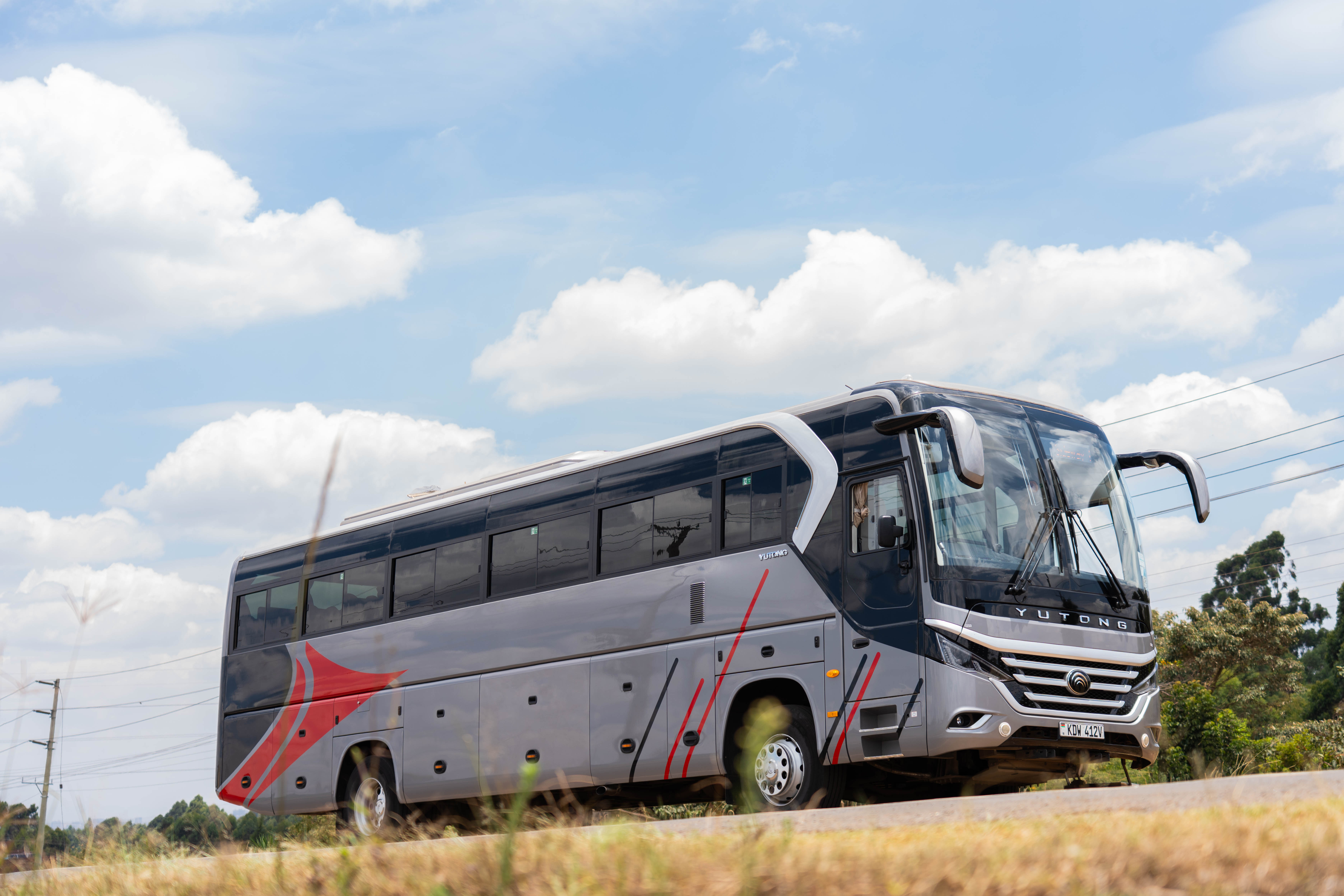 Sideways passenger coach on the road
